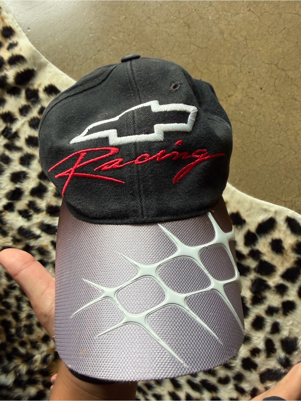 47 Black Cap with Red Racing Script and Silver Patterned Visor